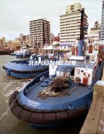 ID 2712 TAMAKI (1972/221grt/IMO 7226550) - one of the two older tugs at Ports of Auckland, new Zealand, seen here with other tug fleet members WAKA KUME (2000/338grt/IMO 9212084), WAIPAPA (2000/338grt/IMO...